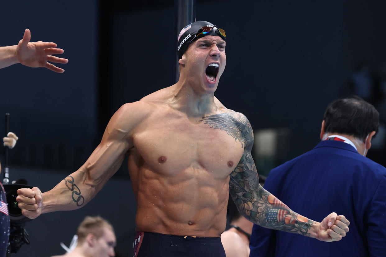 TOKYO, JAPAN - AUGUST 01: Caeleb Dressel of Team United States reacts after winning the gold medal and breaking the world record in the Men's 4 x 100m Medley Relay Final on day nine of the Tokyo 2020 Olympic Games at Tokyo Aquatics Centre on August 01, 2021 in Tokyo, Japan.  (Photo by Al Bello/Getty Images)