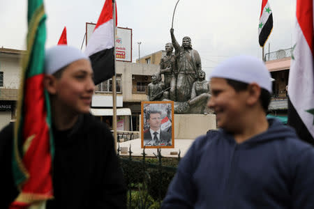 Druze people take part in a rally over U.S. President Donald Trump's support for Israeli sovereignty over the Golan Heights, in Majdal Shams near the ceasefire line between Israel and Syria in the Israeli occupied Golan Heights March 23, 2019 REUTERS/Ammar Awad