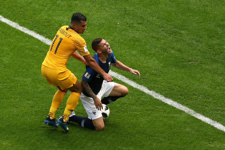 Soccer Football - World Cup - Group C - France vs Australia - Kazan Arena, Kazan, Russia - June 16, 2018 France's Lucas Hernandez in action with Australia's Andrew Nabbout REUTERS/Sergio Perez