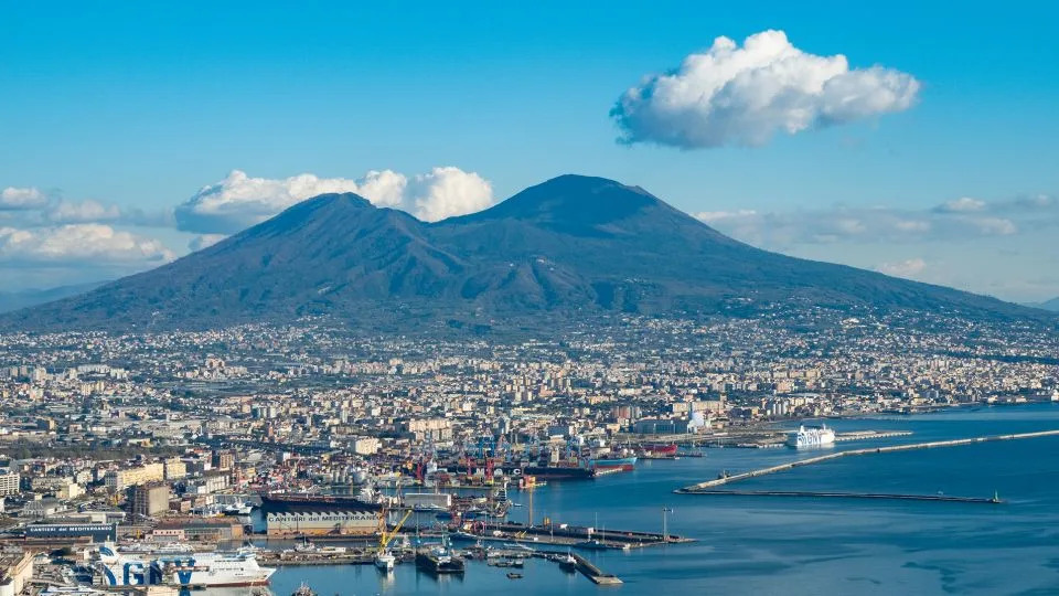 A view of Naples, Italy, with Vesuvius volcano visible in the background. - Lorenzo Di Cola/NurPhoto/Getty Images