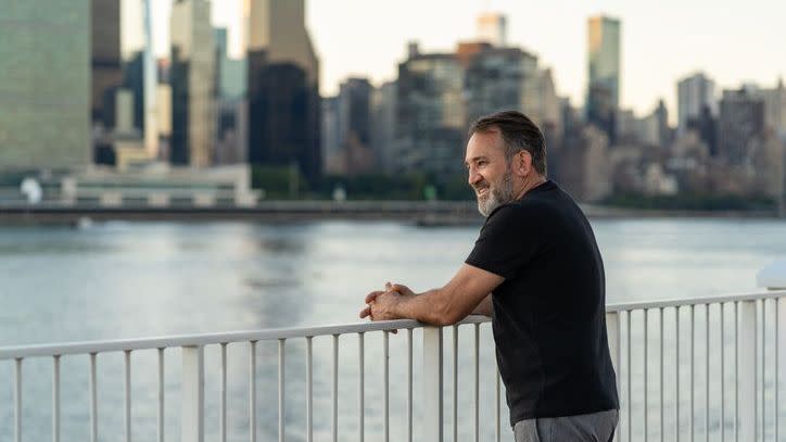 A 54-year-old man looks at the East River in New York.