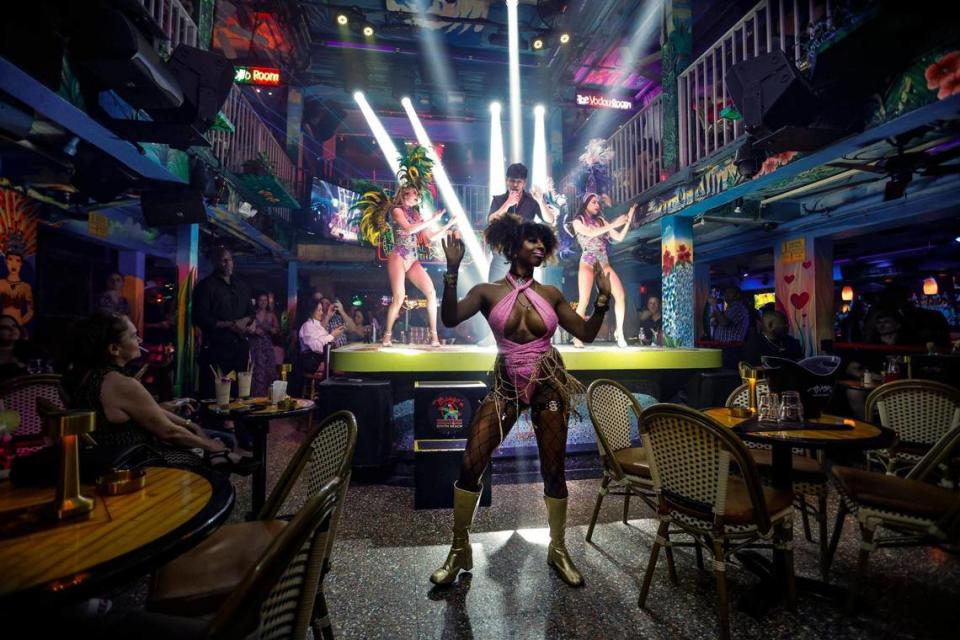 Performers dance on stage at Mango’s Tropical Cafe on Ocean during spring break in Miami Beach, Florida on Saturday, March 9, 2024.