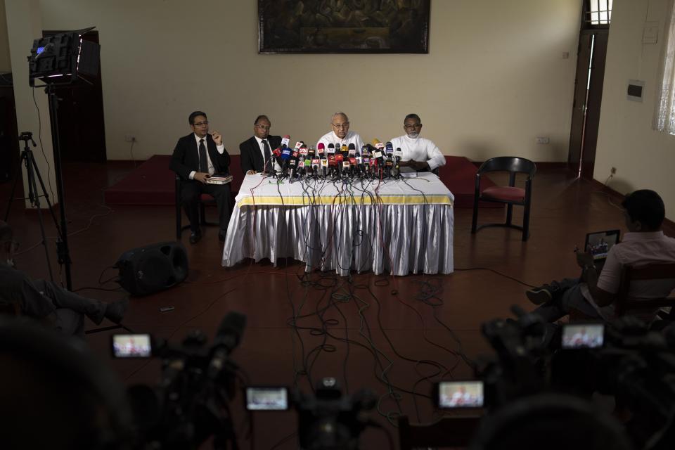Cardinal Malcolm Ranjith, archbishop of Colombo, second right, speaks during a media briefing in Colombo, Sri Lanka, Friday, Jan. 13, 2023. Sri Lanka’s Catholic church wants the country’s former President Maithripala Sirisena be criminally prosecuted for negligence, a day after the country’s top court ordered him pay compensation to the victims of the 2019 Easter Sunday bomb attacks that killed nearly 270 people. (AP Photo/Eranga Jayawardena)