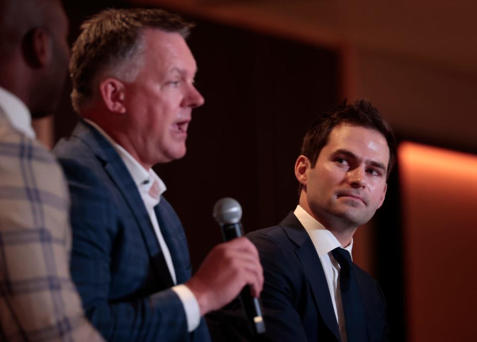 Tigers president Scott Harris, right, looks at his manager A.J. Hinch answer questions during the Detroit Economic Club luncheon at the MotorCity Casino Hotel in Detroit on Tuesday, June 13, 2023.
