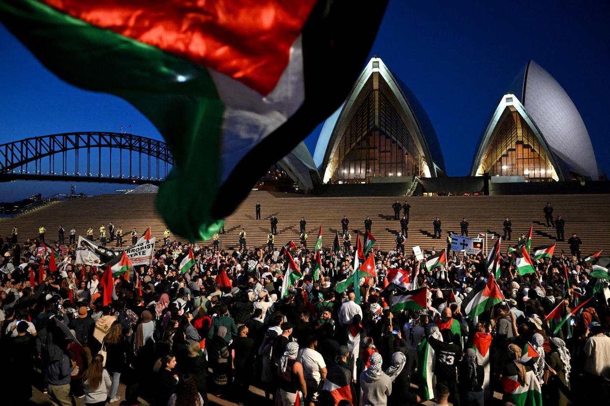 Participants of a pro-Palestinian rally react outside the Sydney Opera House in Sydney, Australia on October 9, 2023. (Dean Lewins/AAP Image via Reuters)