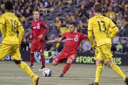 Mar 14, 2015; Columbus, OH, USA; Toronto FC midfielder Sebastian Giovinco (10) shoots the ball in the first half of the game against the Columbus Crew at Mapfre Stadium. Mandatory Credit: Trevor Ruszkowski-USA TODAY Sports