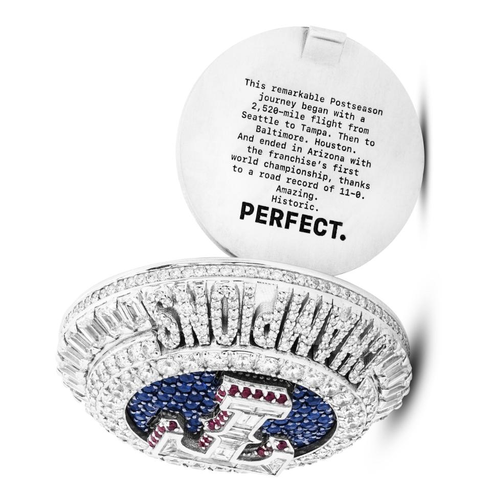 The Texas Rangers World Series rings emphasize how the team went undefeated on the route en route to their first championship.