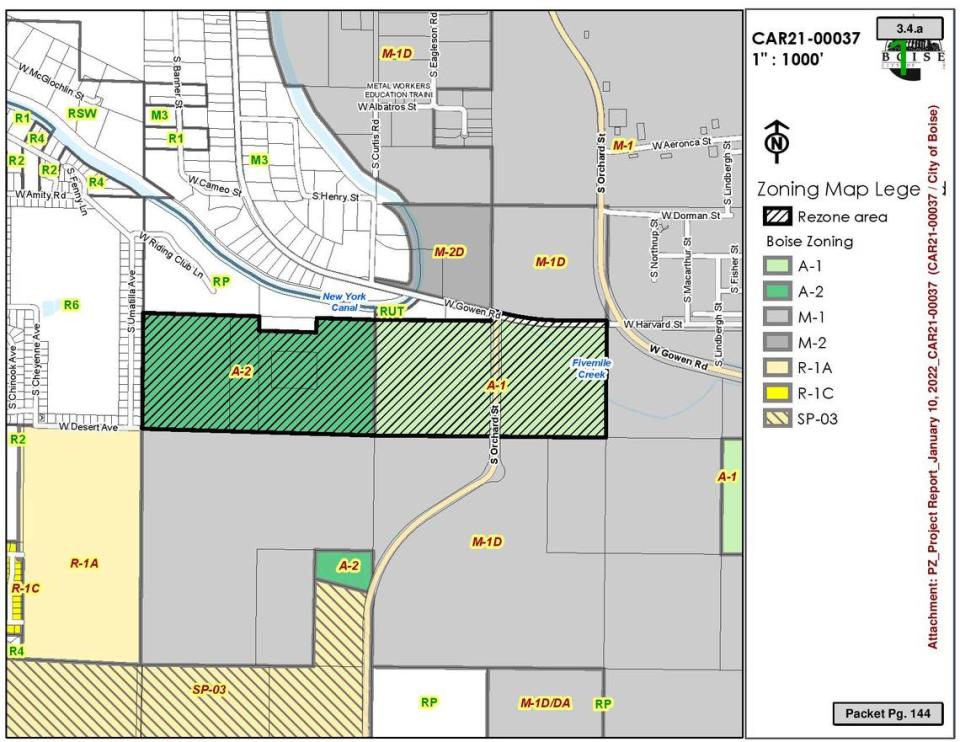 This zoning map shows the previous zoning in southwest Boise east of South Umatilla Avenue near the Boise Airport. That zoning designates land touching homeowners’ properties as A-2 (dark green), meaning it’s intended for “permanent open space.” The lighter green area indicates land that’s zoned as A-1, or open land. But that land doesn’t include “permanent” in its designation. On Tuesday, the council approved rezoning the A-1 parcels to a light industrial zone, while leaving the A-2 parcels untouched.
