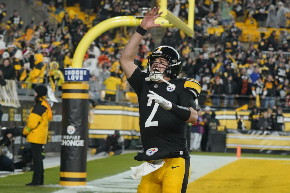 Pittsburgh Steelers quarterback Mason Rudolph (2) celebrates Pittsburgh Steelers wide receiver George Pickens scoring a touchdown during the second half of an NFL football game against the Cincinnati Bengals, Saturday, Dec. 23, 2023, in Pittsburgh. (AP Photo/Gene J. Puskar)