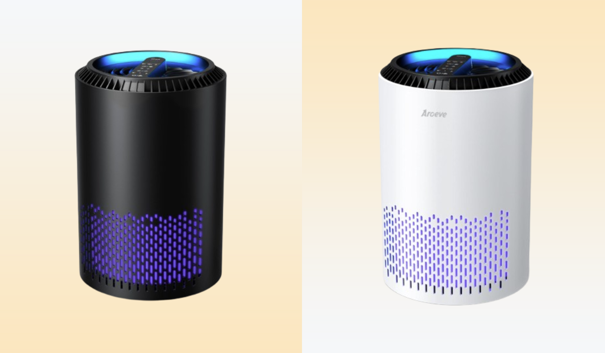 An air purifier with purple accents atop a pastel background.