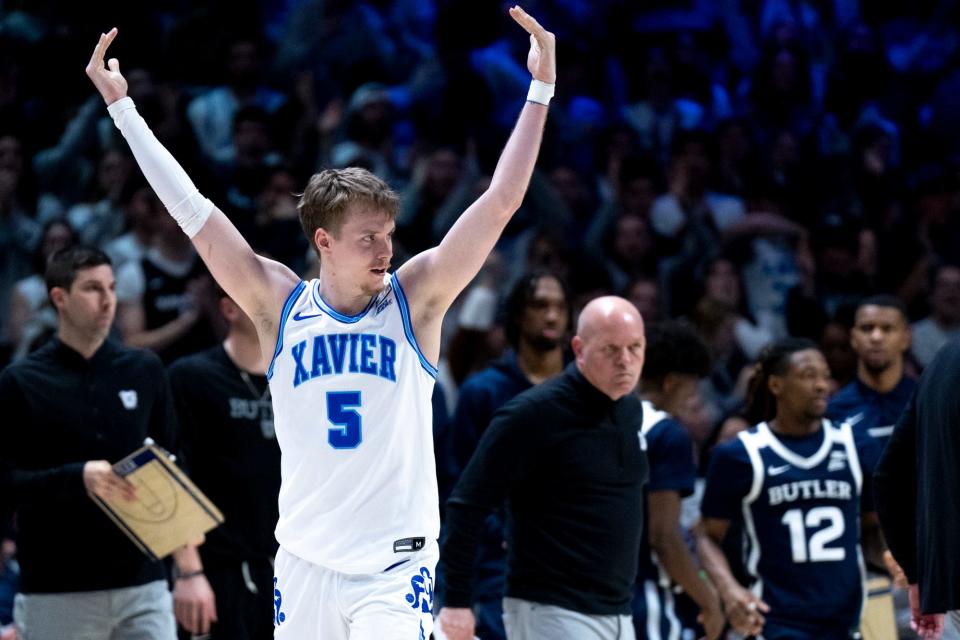 Adam Kunkel (5) shot 42.5% from 3-point range in his final season with the Musketeers in 2023.