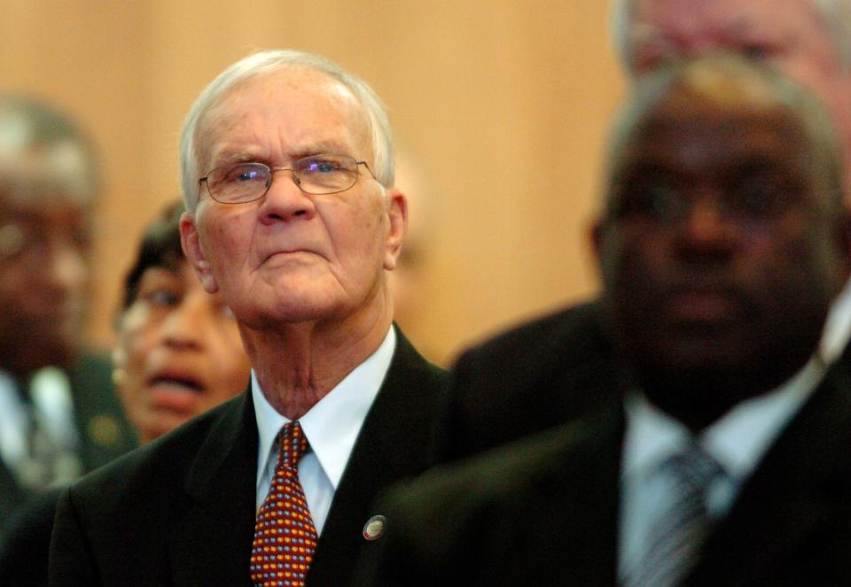 Rep. Dewey Hill, D-Columbus, stands for the Roll Call of Districts, prior his Oath of Office during the opening day of the General Assembly in Raleigh, N.C., on Wednesday, Jan. 24, 2006. (Special to The Star-News/Sara D. Davis)