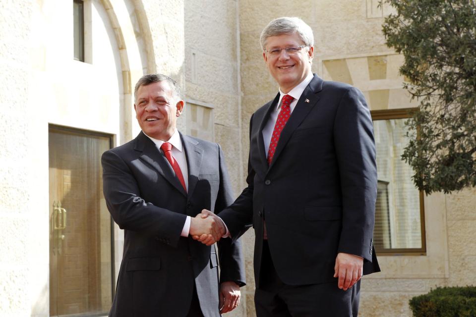 Jordan's King Abdullah welcomes Canada's Prime Minister Stephen Harper in Amman