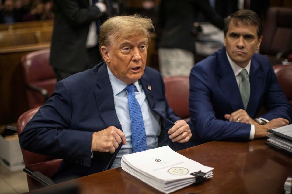 Donald Trump appears in a Manhattan criminal courtroom in 26 April (EPA)