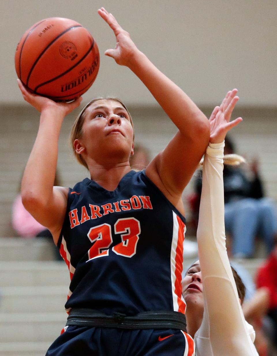 Harrison Raiders forward Riley Whitlock (23) shoots the ball during the IU Health Hoops Classic girl’s basketball fifth place game against the Twin Lakes, Saturday, Nov. 18, 2023, at Harrison High School in West Lafayette, Ind. Twin Lakes won 61-42.