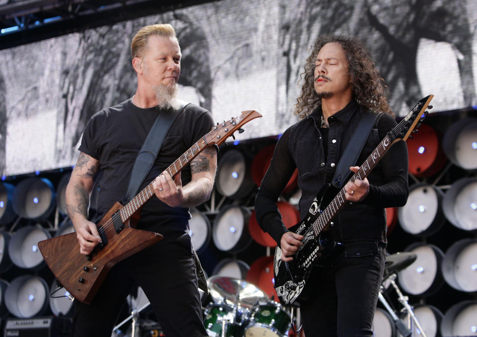 File photo dated 7/7/2007 of James Hetfield (left) and Kirk Hammett of Metallica performing during the Live Earth Concert at Wembley Stadium. The veteran US rockers have been announced as the Saturday night headliners for this year's Glastonbury festival.