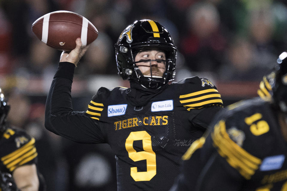 Hamilton Tiger-Cats quarterback Dane Evans throws the ball against the Winnipeg Blue Bombers during the first half of a CFL football game in the 107th Grey Cup in Calgary, Alberta, Sunday, Nov. 24, 2019. (Frank Gunn/The Canadian Press via AP)