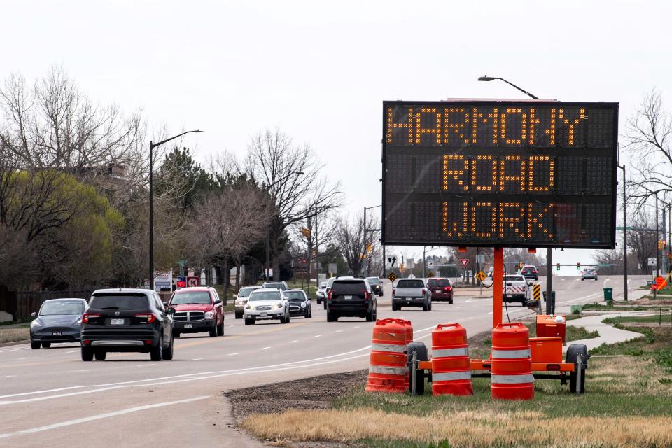 A sign indicating road construction on Harmony Road is pictured Friday in Fort Collins. Crews have begun repairing concrete then will lay new asphalt on Harmony Road from Timberline Road east to Strauss Cabin Road.