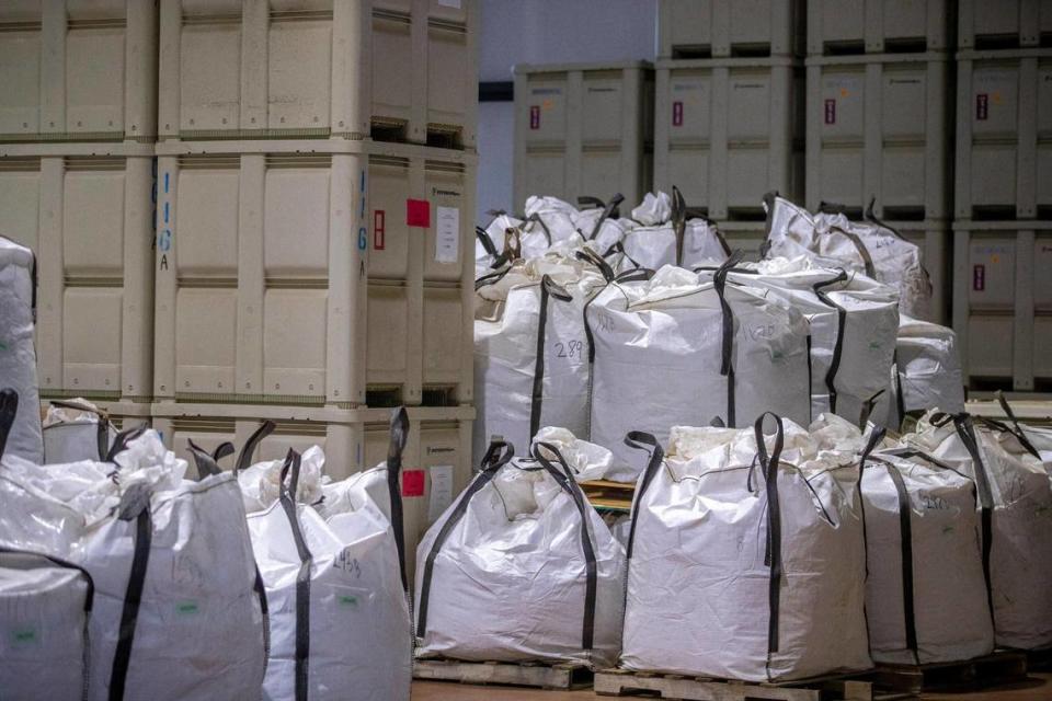 Bags and containers of organic hemp flower buds are stored in a Kentucky Heritage Hemp’s warehouse in Nelson County, Ky., on Wednesday, March 22, 2023.