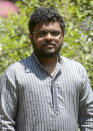 Mukund Gowda, a 25-year-old activist, stands for a photograph in Bengaluru, India, Thursday, March 4, 2021. Gowda was detained at his local police station for a full day last year because he wrote a letter to the prime minister’s office to draw attention to a faulty road in his neighbourhood and called out his local representatives for not taking any action. He shared the letter on his social media, which quickly went viral and landed him inside a police station. Gowda was let go, but the experience was enough to make him and his family anxious. He stopped posting on social media and took a step back from activism for a few months. (AP Photo/Kashif Masood)