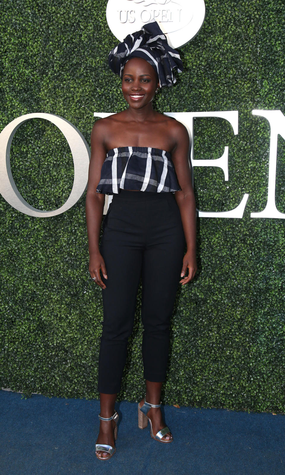 <p>Who: Lupita Nyong'o</p><p>When: August 30, 2016 </p><p>Why: We love the proportions of Lupita Nyong'o's high-waist pant and fluttery top, but more obviously, her matching headscarf is <em>everything.</em> </p>