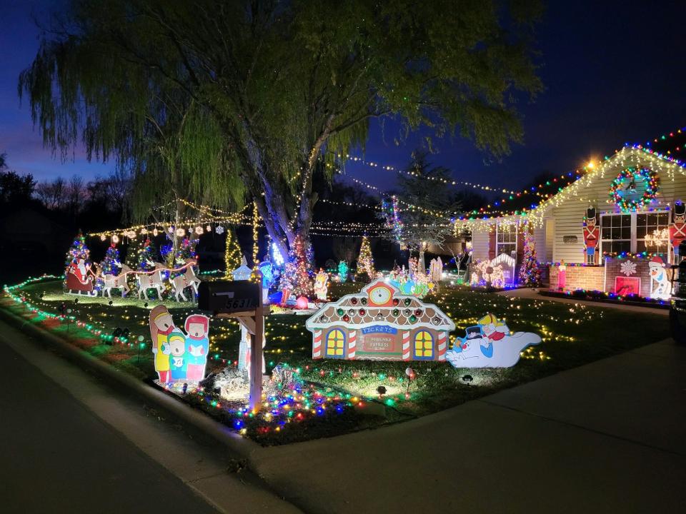 The Rogers' display features handmade cutouts such as Rudolph the Red-Nosed Reindeer, Frosty the Snowman and — new this year — Dr. Seuss characters.