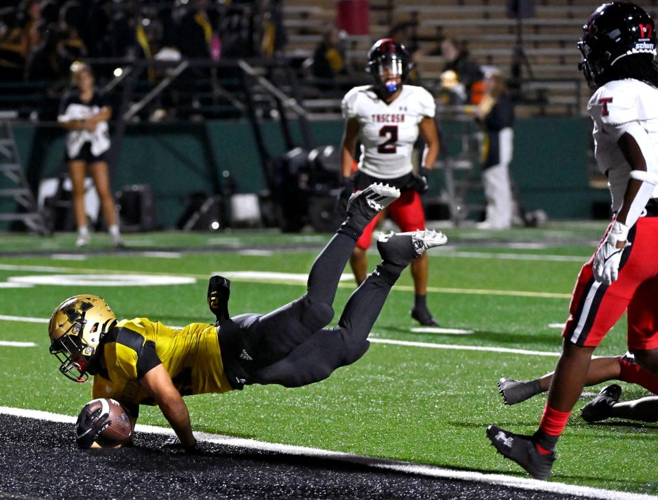 Abilene High running back Chad Lara dives into the end zone for an Eagles touchdown against Amarillo Tascosa on Friday in Abilene.