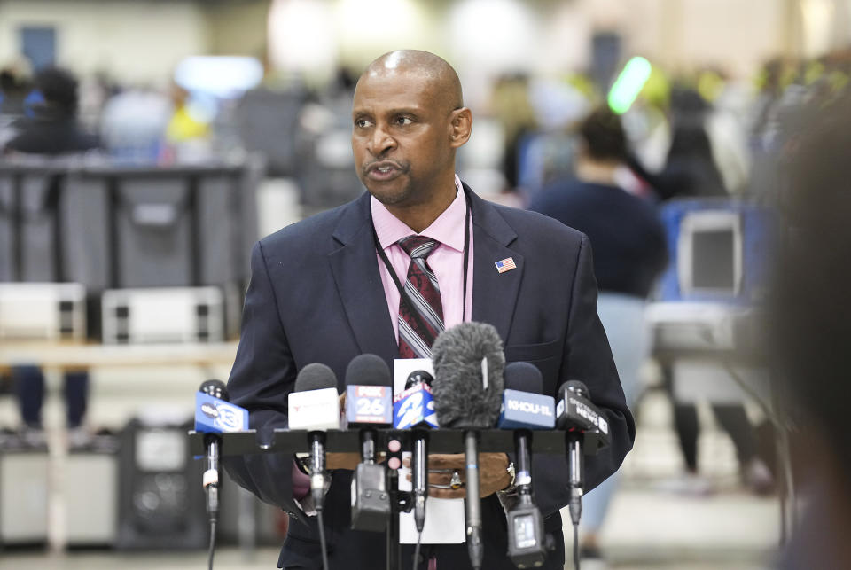 Clifford Tatum, Harris County Elections Administrator, addresses the media as ballots are counted at NRG Arena on, Nov. 8, 2022 in Houston. Various problems in last November’s midterm elections will be center stage in a civil trial beginning Tuesday, Aug 1, 2023. (Elizabeth Conley/Houston Chronicle via AP)