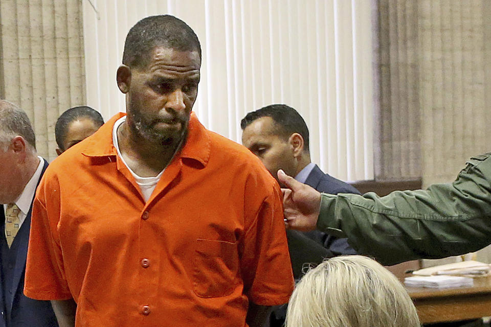 FILE - R. Kelly turns to exit during a hearing at the Leighton Criminal Court building, in Chicago, Sept. 17, 2019. R&B legend R. Kelly is entering another phase of his well-publicized downward spiral with a sentencing in a New York City courtroom Wednesday, June 29, 2022, that could put him behind bars for a quarter century or more. (Antonio Perez/Chicago Tribune via AP, Pool, File)