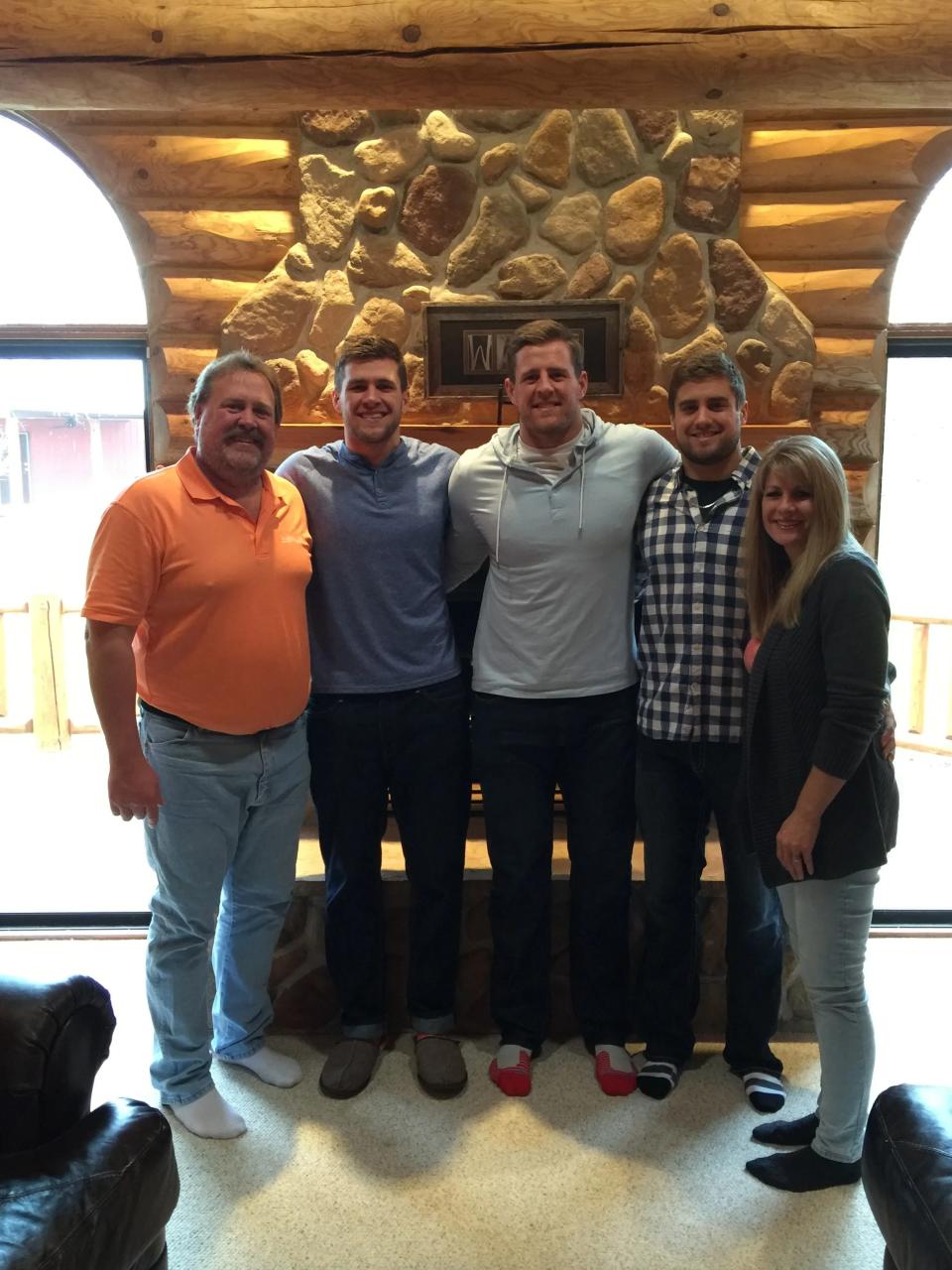 The Watt family, from left, John, T.J., J.J., Derek and Connie have become a sports business brand.