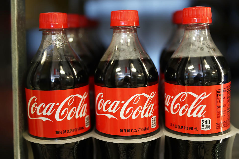 MIAMI, FL - APRIL 25:  Coca Cola products are seen on a store shelf as the company announces plans to cut 1200  corporate staff jobs on April 25, 2017 in Miami, Florida. The announced changes come as the company battles a slide in soda sales which along with higher costs has lead to a 20 percent drop in quarterly profit.  (Photo by Joe Raedle/Getty Images)