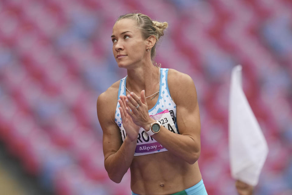 Uzbekistan's Ekaterina Voronina reacts as she competes during the women's heptathlon high jump at the 19th Asian Games in Hangzhou, China, Saturday, Sept. 30, 2023. (AP Photo/Lee Jin-man)