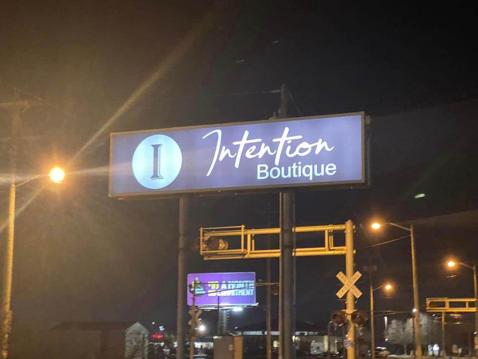 Intention Botique street sign