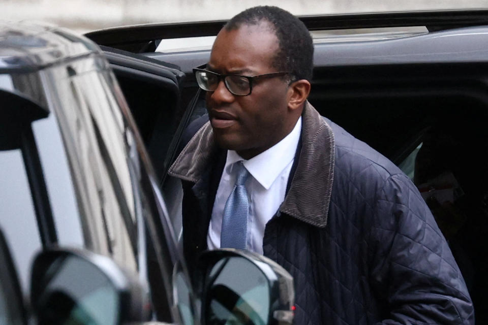 Chancellor of the Exchequer Kwasi Kwarteng exits a car on Downing Street in London, Britain, October 14, 2022. REUTERS/Henry Nicholls