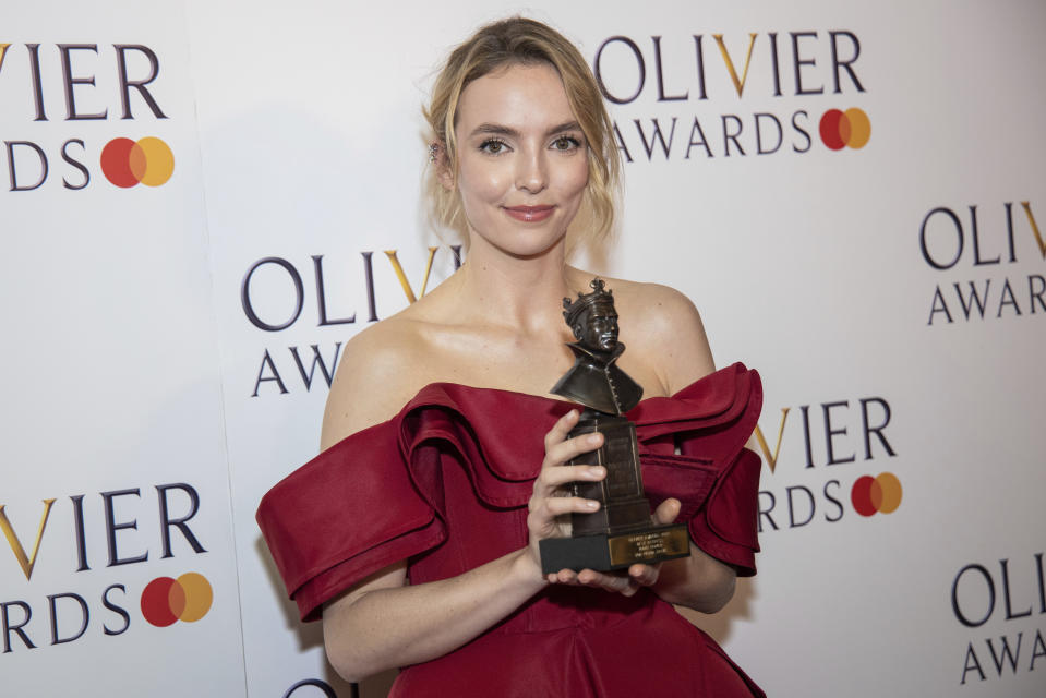 Jodie Comer, winner of the Best Actress award for "Prima Facie" poses for photographers in the winner's room during the Olivier Awards in London, Sunday, April 2, 2023. (Photo by Vianney Le Caer/Invision/AP)