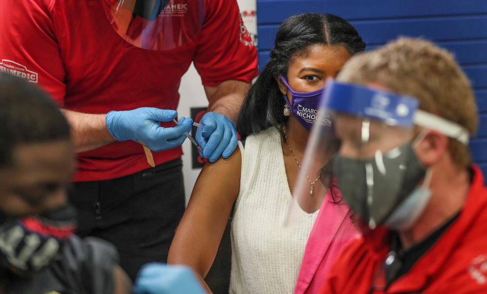 Milwaukee County Board Chairwoman Marcelia Nicholson gets her first dose of the Moderna COVID-19 vaccine on March 23, 2021.