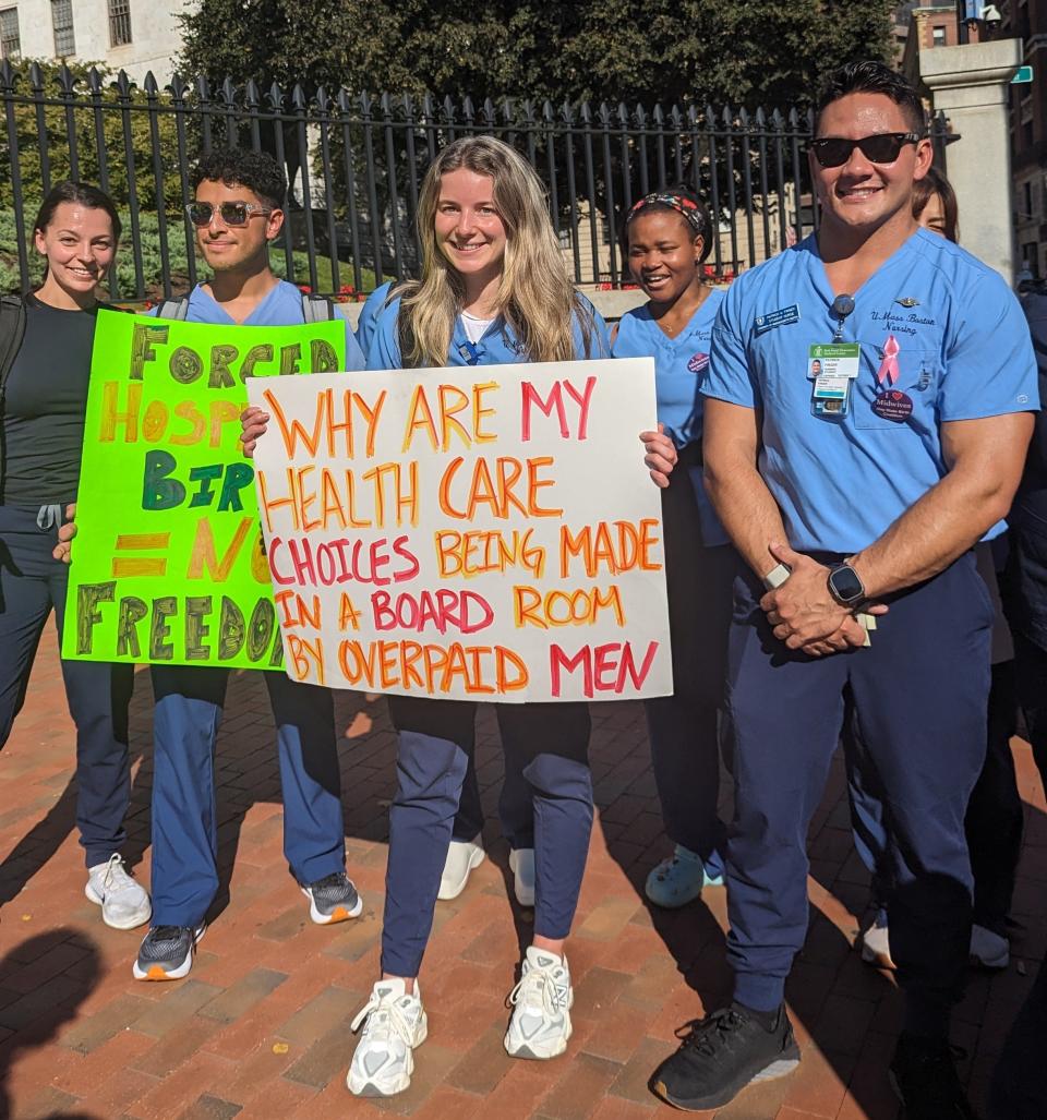Hannah Neale, along with her classmates from UMass Boston joins the rally in front of the Massachusetts State House in Boston, commemorating Midwife Advocacy Day on Thursday, October 5.