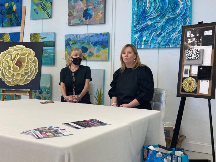 The yellow bloom painting of Donna Hope, left, gets suggested decor complements from Candice Kelber in the 2021 expo.