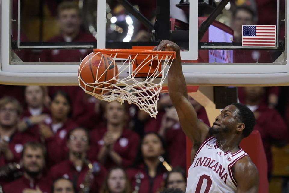 Indiana's Xavier Johnson dunks during the first half of an NCAA college basketball game against Army, Sunday, Nov. 12, 2023, in Bloomington, Ind. (AP Photo/Darron Cummings)