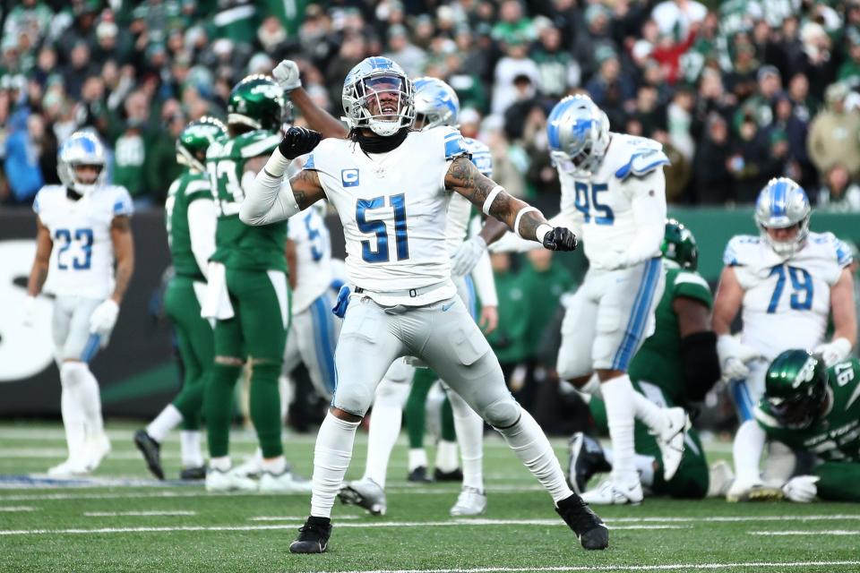 Detroit Lions linebacker Josh Woods celebrates during the second half against the New York Jets at MetLife Stadium.