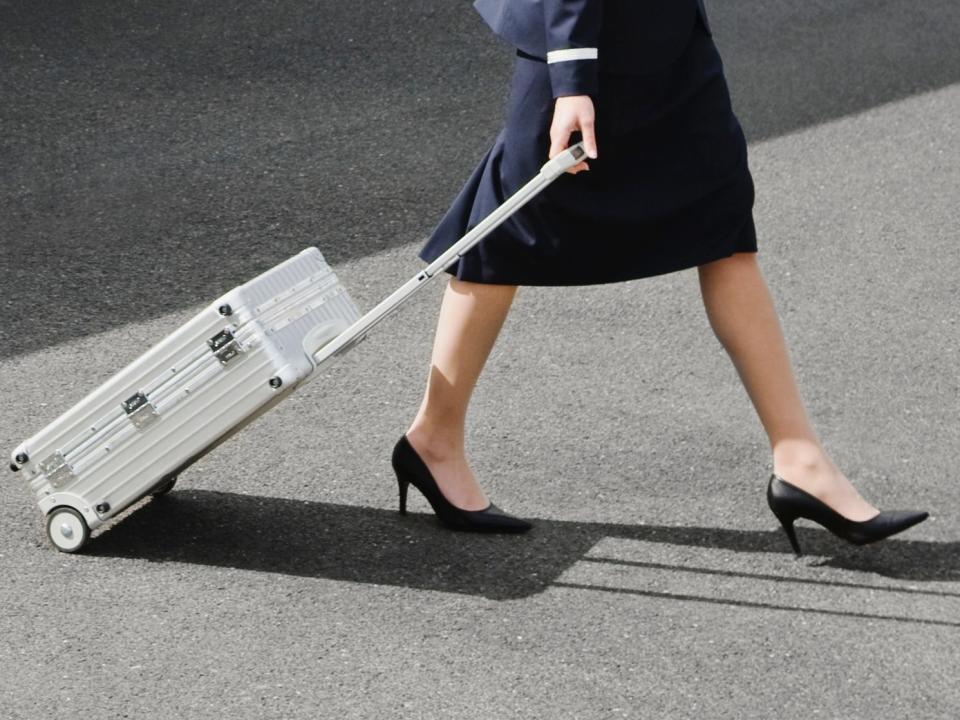 Flight attendant on runway