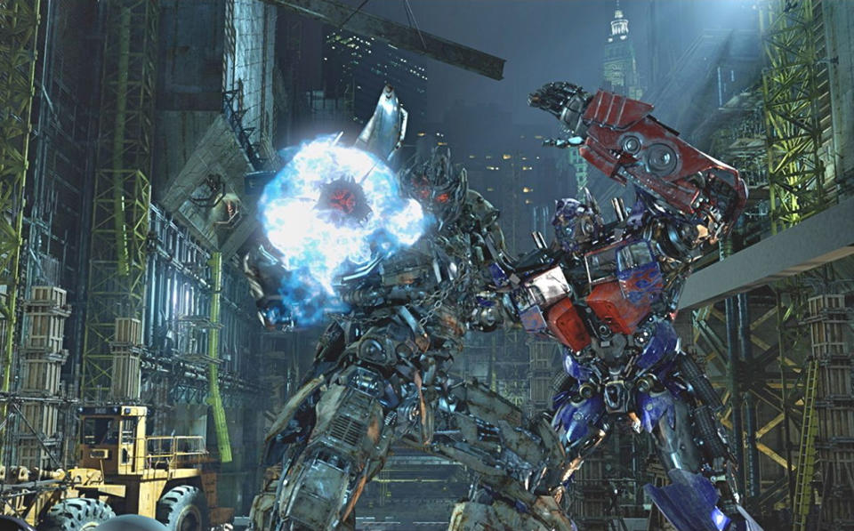 In this undated image released by Universal Studios Hollywood, characters Megatron, left, and Optimus Prime are displayed during the "Transformers the Ride: 3D," attraction at Universal Studios Hollywood in Los Angeles. Debuting May 25 at Universal Studios Hollywood, the ride, based on the film franchise, offers motion-simulator vehicles and 3D high definition video. (AP Photo/Universal Studios Hollywood)