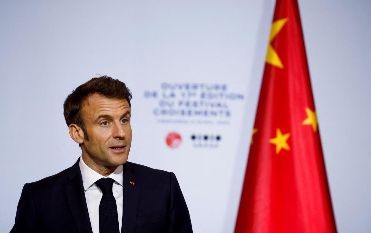 French President Emmanuel Macron delivers a speech to inaugurate the Festival Croisements at the Red Brick Museum in Beijing, China
