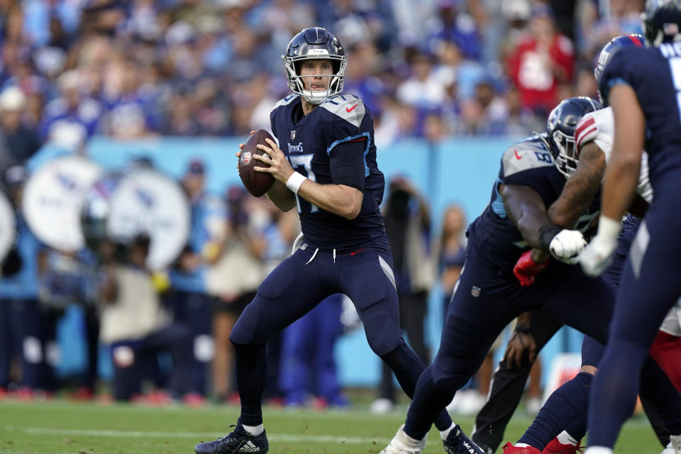 Tennessee Titans quarterback Ryan Tannehill (17) looks for a receiver during the first half of an NFL football game against the New York Giants Sunday, Sept. 11, 2022, in Nashville. (AP Photo/Mark Humphrey)