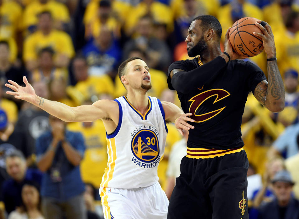 Jun 19, 2016; Oakland, CA, USA; Cleveland Cavaliers forward LeBron James (23) handles the ball against Golden State Warriors guard Stephen Curry (30) during the third quarter in game seven of the NBA Finals at Oracle Arena. Mandatory Credit: Bob Donnan-USA TODAY Sports TPX IMAGES OF THE DAY