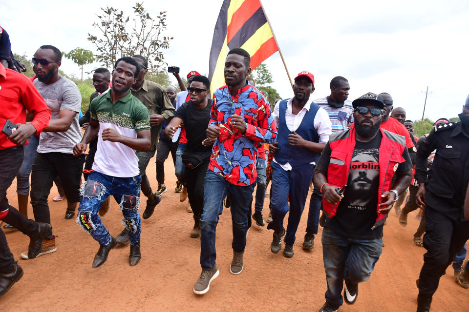 Bobi Wine takes his supporters on a run on a marram road in Katakwi district in Eastern Uganda, November 14, 2020.