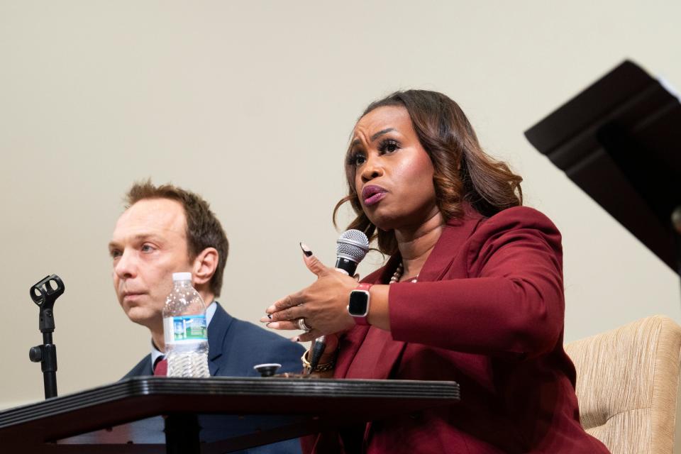 Columbus City Council member Shayla Favor answers questions from the audience Thursday during the debate among candidates running for Franklin County prosecutor.