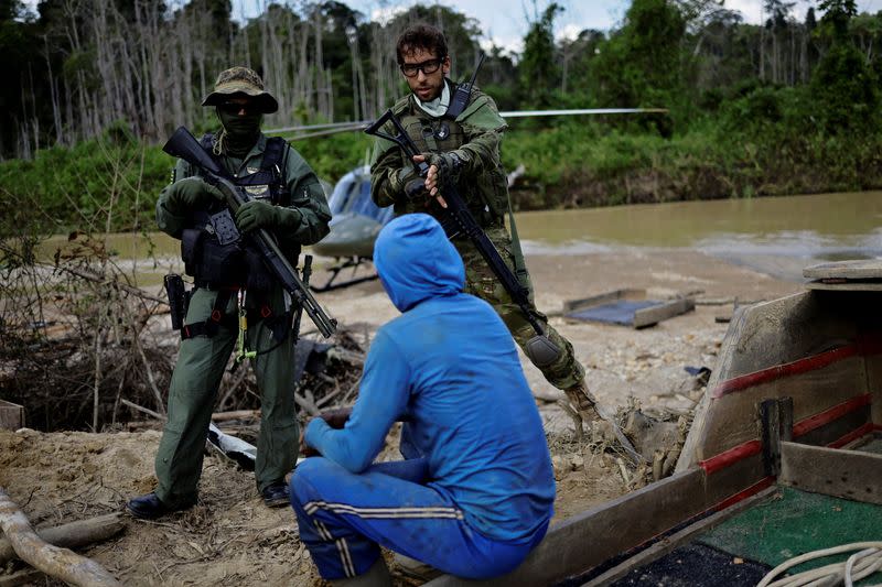 The Wider Image: Gold miners bring fresh wave of suffering to Brazil's Yanomami