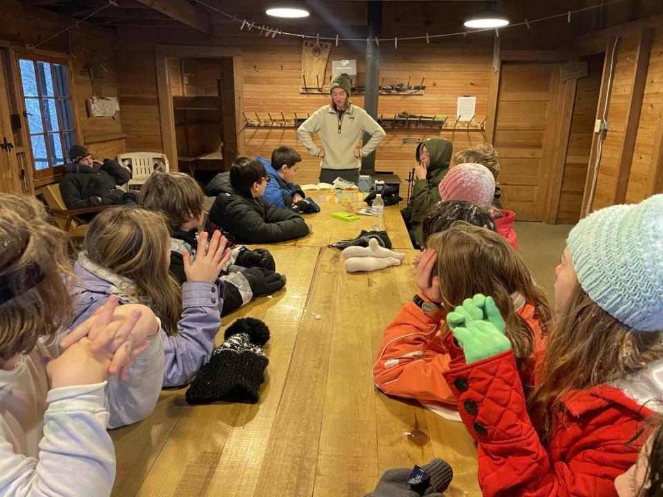 Poet Shanley Smith-Poole works with Alanson students as part of the “Writing the Land: Youth Write the Land” book project.