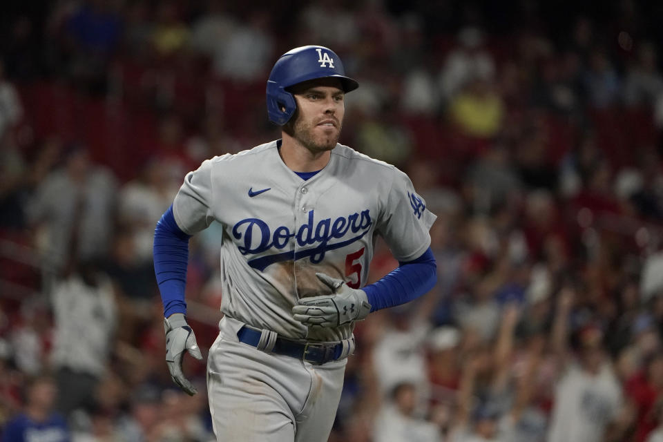 Los Angeles Dodgers' Freddie Freeman rounds the bases after hitting a solo home run during the ninth inning of a baseball game against the St. Louis Cardinals Tuesday, July 12, 2022, in St. Louis. (AP Photo/Jeff Roberson)
